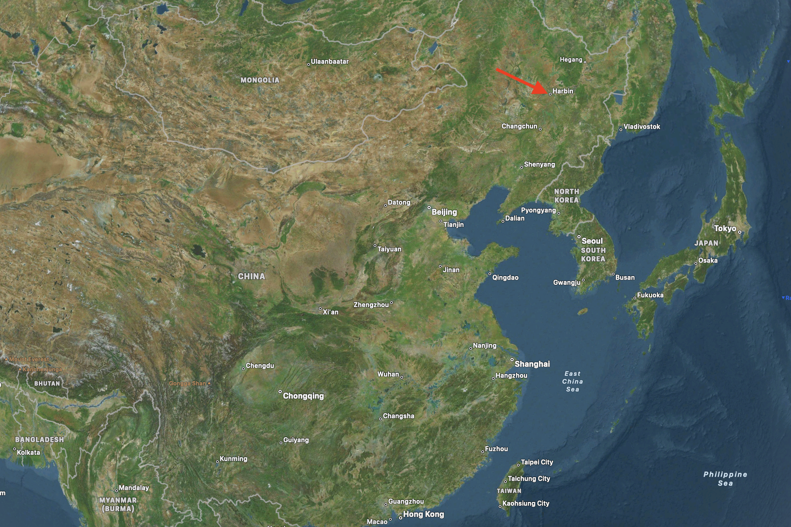 A satellite map zoomed out to see most of china. Harbin is circled in the far northeast.