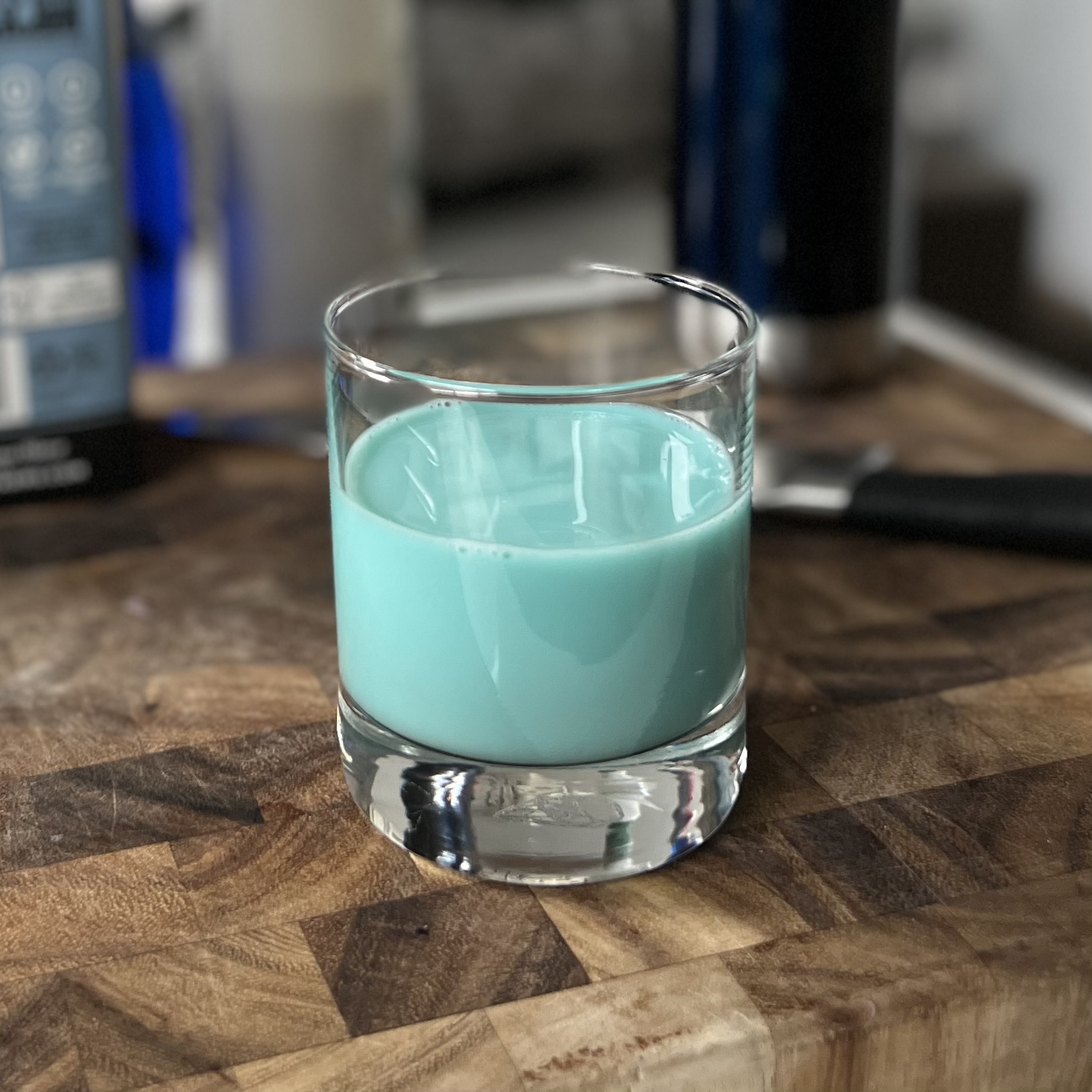 Photo of a pale blue drink.